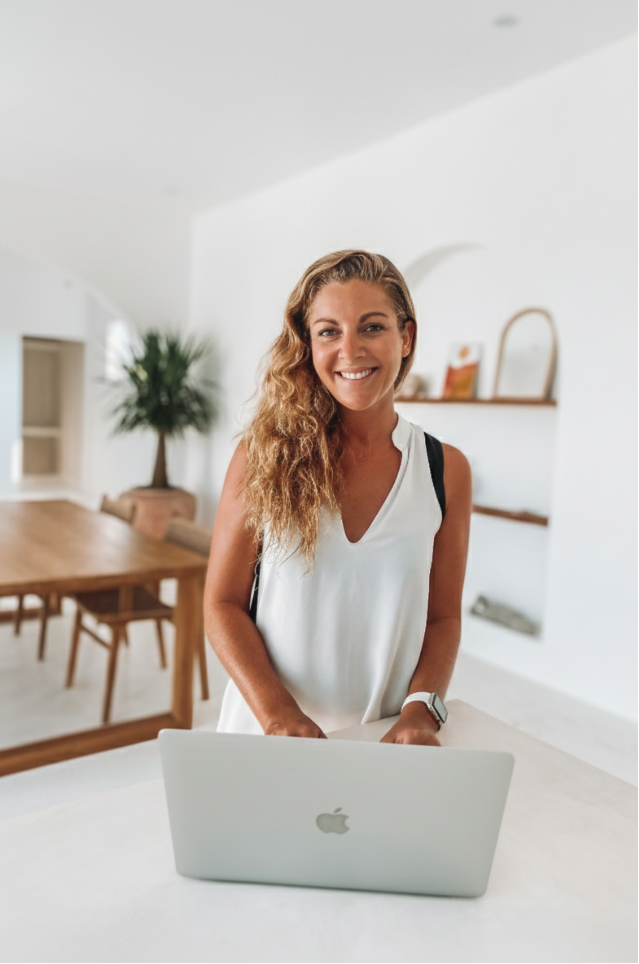 Verena Husemann working at her desk in a bright workspace